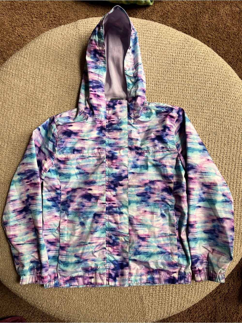 Eddie Bauer girls' abstract print hooded windbreaker jacket.